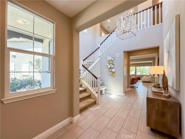 6184 Lafayette St, Chino, CA 91710 - stairs featuring a chandelier and baseboards
