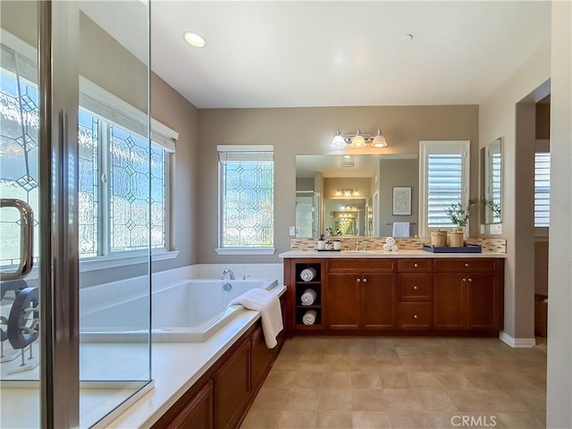 6184 Lafayette St, Chino, CA 91710 - bathroom featuring a garden tub, vanity, and a shower stall