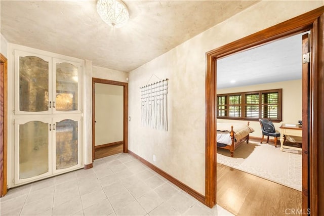 1465 Via Coronel, Palos Verdes Estates, CA 90274 - hallway with baseboards and light tile patterned flooring
