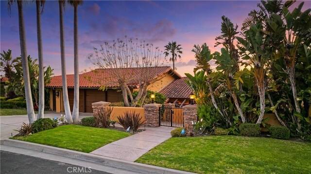 1465 Via Coronel, Palos Verdes Estates, CA 90274 - view of front of house featuring an attached garage, a tile roof, a gate, and driveway