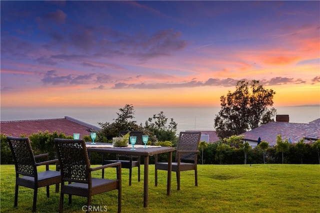 1465 Via Coronel, Palos Verdes Estates, CA 90274 - yard at dusk featuring a lawn and a water view