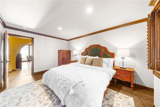 1465 Via Coronel, Palos Verdes Estates, CA 90274 - bedroom featuring crown molding, arched walkways, recessed lighting, baseboards, and wood finished floors