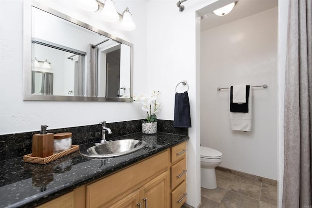 3625 Vista Oceana Unit 18, Oceanside, CA 92057 - full bathroom with toilet, vanity, and baseboards