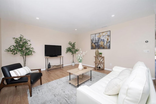 3625 Vista Oceana Unit 18, Oceanside, CA 92057 - living room featuring wood finished floors, baseboards, and recessed lighting