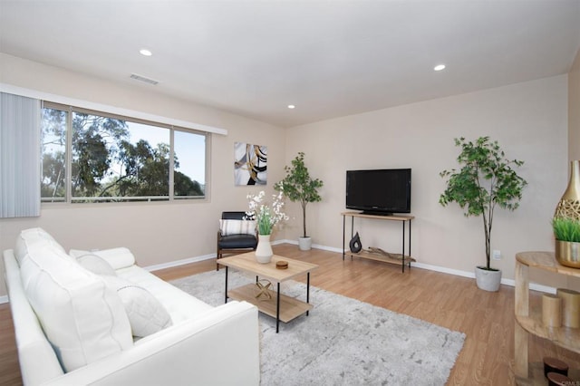 3625 Vista Oceana Unit 18, Oceanside, CA 92057 - living area with light wood-style floors, baseboards, and recessed lighting