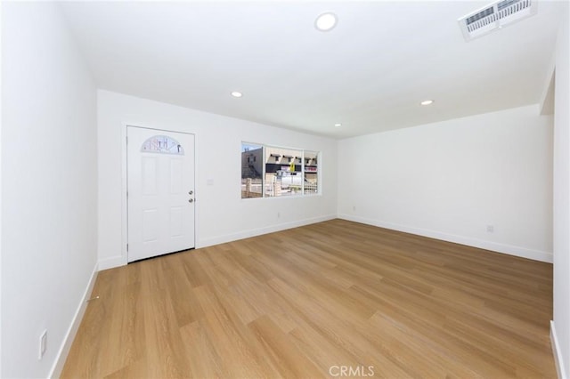 22016 Schoolcraft St, Canoga Park, CA 91303 - spare room featuring light wood finished floors, recessed lighting, and baseboards