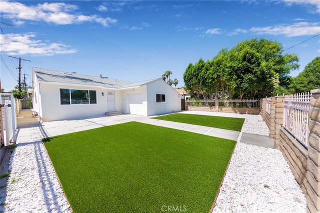 22016 Schoolcraft St, Canoga Park, CA 91303 - rear view of property featuring stucco siding, a garage, and a patio area