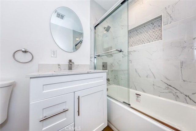 22016 Schoolcraft St, Canoga Park, CA 91303 - bathroom featuring vanity, toilet, and enclosed tub / shower combo