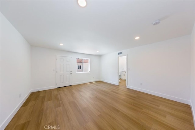 22016 Schoolcraft St, Canoga Park, CA 91303 - unfurnished room with light wood finished floors, baseboards, a smoke detector, and recessed lighting
