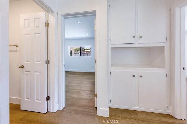 22016 Schoolcraft St, Canoga Park, CA 91303 - hallway with wood finished floors and baseboards