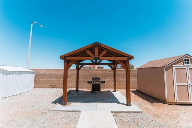 15193 Arcadian St, Adelanto, CA 92301 - fenced backyard featuring a patio area, a gazebo, and grilling area