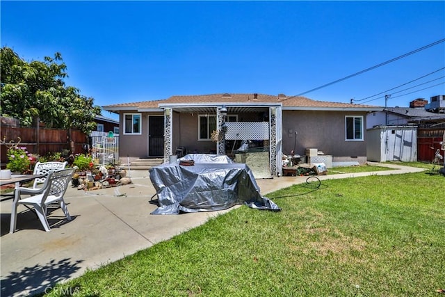1706 James Pl, Pomona, CA 91767 - back of house with stucco siding and a patio