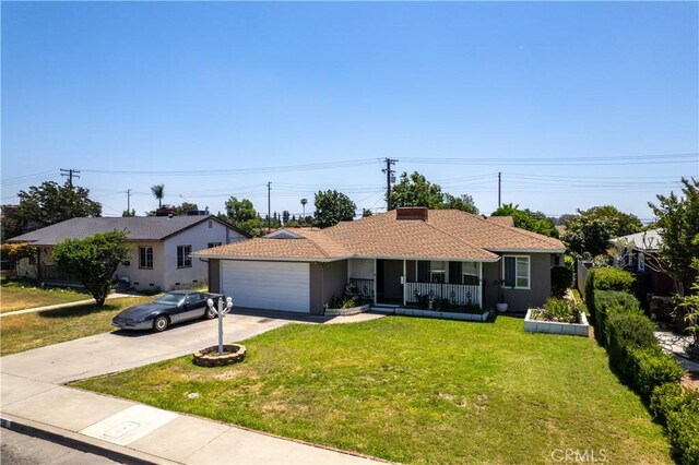 1706 James Pl, Pomona, CA 91767 - single story home with a front yard, driveway, an attached garage, and stucco siding