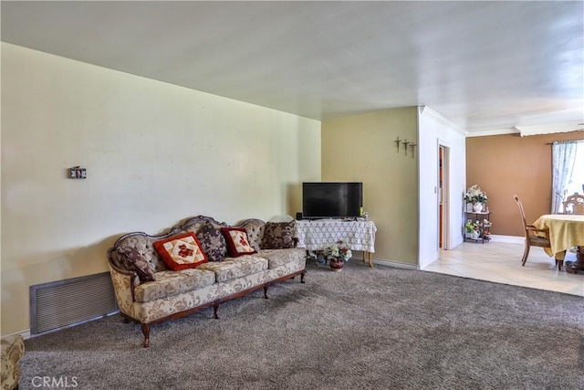 1706 James Pl, Pomona, CA 91767 - carpeted living area with baseboards and tile patterned flooring