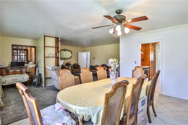 1706 James Pl, Pomona, CA 91767 - dining room featuring ceiling fan, light tile patterned flooring, crown molding, and baseboards