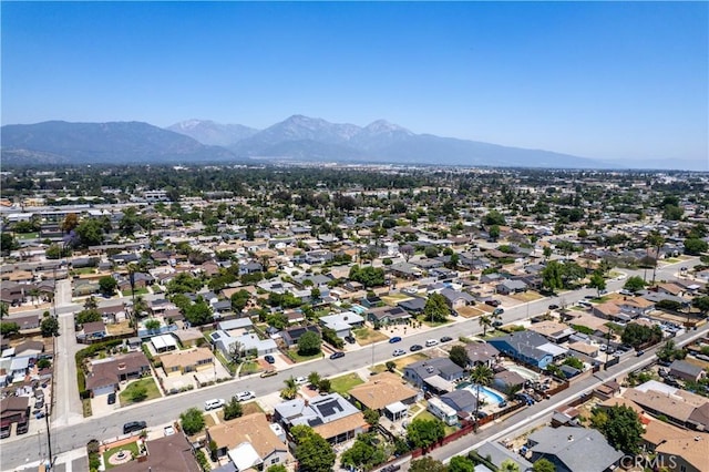 1706 James Pl, Pomona, CA 91767 - aerial view of residential area with a mountainous background