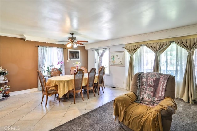 1706 James Pl, Pomona, CA 91767 - dining space featuring light tile patterned flooring, ceiling fan, baseboards, and an AC wall unit