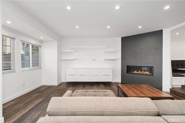 18653 Burbank Blvd Unit 2, Tarzana, CA 91356 - living room featuring wood finished floors, a large fireplace, baseboards, and recessed lighting