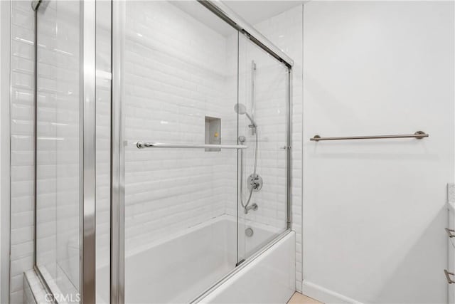 18653 Burbank Blvd Unit 2, Tarzana, CA 91356 - bathroom featuring bath / shower combo with glass door, baseboards, and vanity