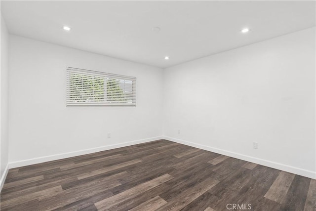 18653 Burbank Blvd Unit 2, Tarzana, CA 91356 - unfurnished room with dark wood-style flooring, recessed lighting, and baseboards