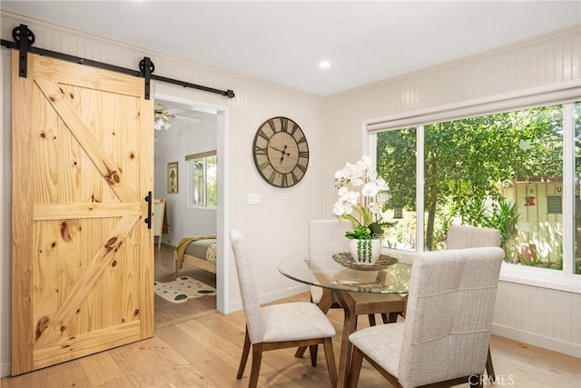 29422 Modjeska Canyon Rd, Modjeska Canyon, CA 92676 - dining space featuring crown molding, a barn door, light wood finished floors, healthy amount of natural light, and recessed lighting