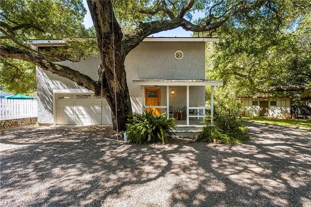 29422 Modjeska Canyon Rd, Modjeska Canyon, CA 92676 - view of front facade with stucco siding and a porch