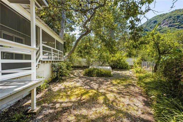 29422 Modjeska Canyon Rd, Modjeska Canyon, CA 92676 - view of yard featuring a mountain view and a sunroom