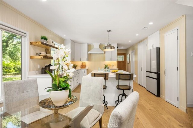 29422 Modjeska Canyon Rd, Modjeska Canyon, CA 92676 - dining room with light wood-style flooring, recessed lighting, and crown molding