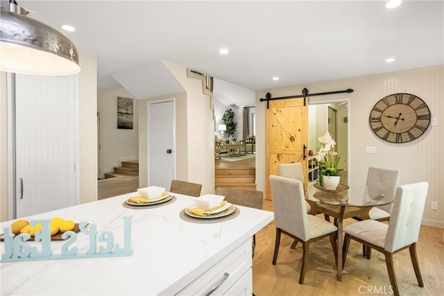 29422 Modjeska Canyon Rd, Modjeska Canyon, CA 92676 - dining room featuring a barn door, stairs, light wood finished floors, and recessed lighting