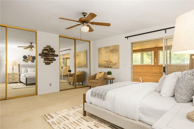 29422 Modjeska Canyon Rd, Modjeska Canyon, CA 92676 - bedroom with two closets, carpet flooring, and a ceiling fan