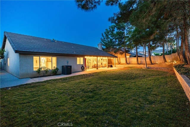 42311 Camden Way, Lancaster, CA 93536 - rear view of property with a patio area, central AC unit, and stucco siding