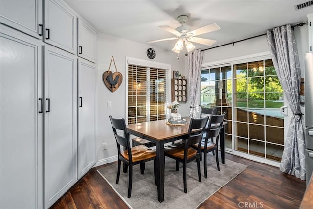 42311 Camden Way, Lancaster, CA 93536 - dining area featuring dark wood-style floors, ceiling fan, and baseboards