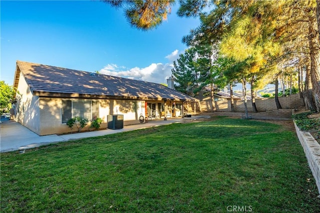 42311 Camden Way, Lancaster, CA 93536 - rear view of house featuring central AC and a patio