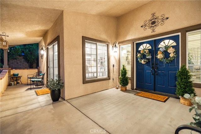 42311 Camden Way, Lancaster, CA 93536 - doorway to property featuring french doors and stucco siding