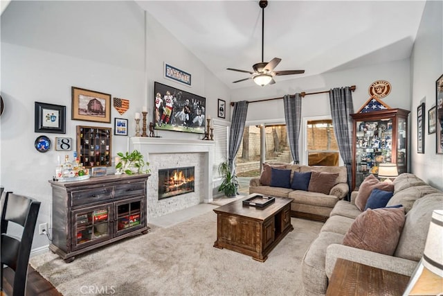 42311 Camden Way, Lancaster, CA 93536 - carpeted living area with ceiling fan, a fireplace with flush hearth, and high vaulted ceiling