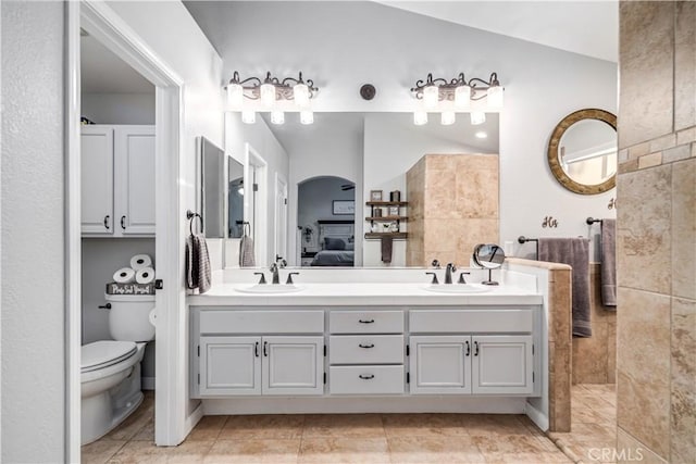 42311 Camden Way, Lancaster, CA 93536 - ensuite bathroom featuring double vanity, toilet, a walk in shower, and tile patterned floors