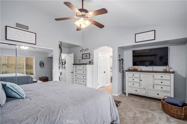 42311 Camden Way, Lancaster, CA 93536 - carpeted bedroom featuring arched walkways, high vaulted ceiling, ceiling fan, a closet, and baseboards