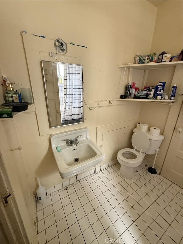 415417 Euclid Ave, Los Angeles, CA 90063 - half bath with toilet, tile patterned flooring, and a sink