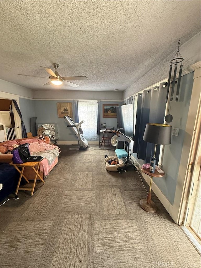 415417 Euclid Ave, Los Angeles, CA 90063 - bedroom with carpet flooring, a textured ceiling, ceiling fan, and baseboards