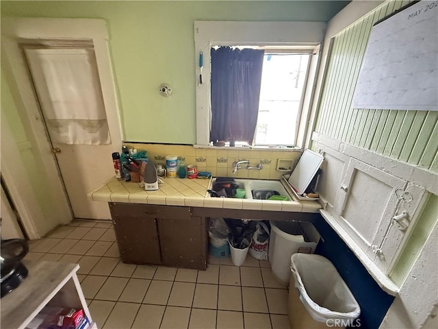 415417 Euclid Ave, Los Angeles, CA 90063 - bathroom featuring tile patterned floors, a sink, and decorative backsplash