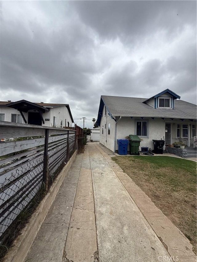 415417 Euclid Ave, Los Angeles, CA 90063 - view of property exterior with concrete driveway and stucco siding