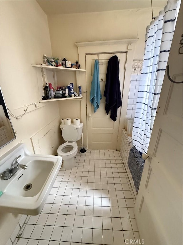 415417 Euclid Ave, Los Angeles, CA 90063 - bathroom with a sink, tile patterned flooring, and toilet