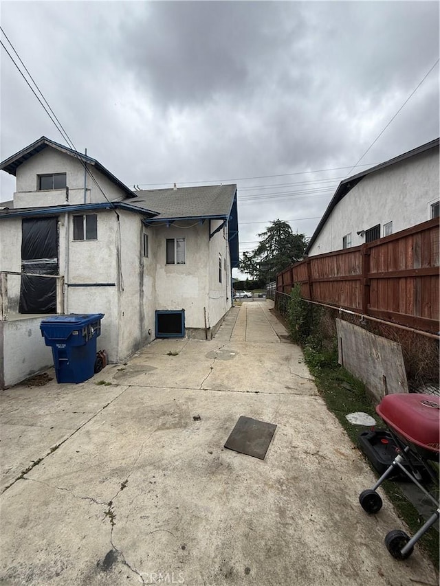 415417 Euclid Ave, Los Angeles, CA 90063 - view of home's exterior featuring roof with shingles and stucco siding