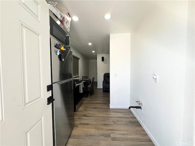 7425 I Ave, Hesperia, CA 92345 - hallway featuring baseboards, wood finished floors, and recessed lighting