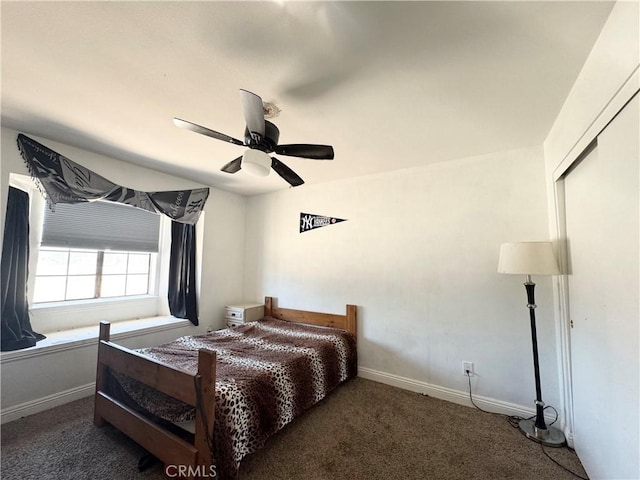 7425 I Ave, Hesperia, CA 92345 - carpeted bedroom featuring baseboards and a ceiling fan