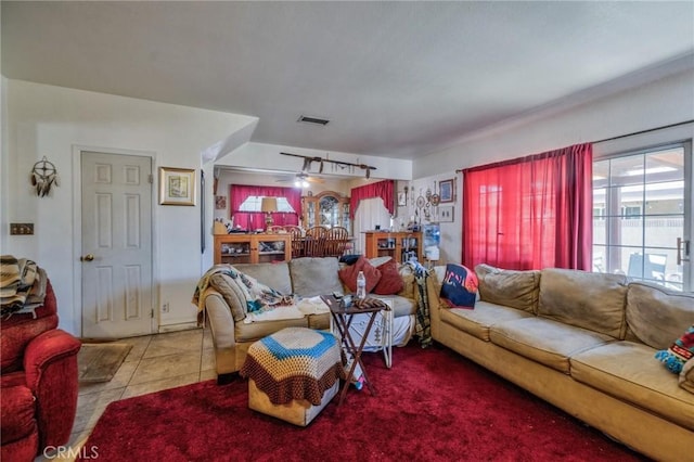 9419 Bartley Ave, Santa Fe Springs, CA 90670 - tiled living area featuring a ceiling fan