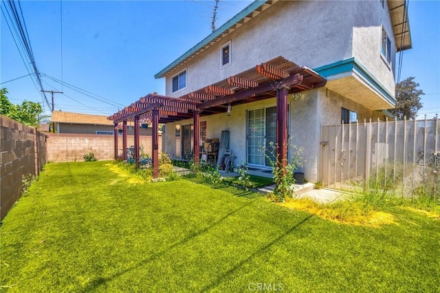 9419 Bartley Ave, Santa Fe Springs, CA 90670 - rear view of house with a pergola and stucco siding
