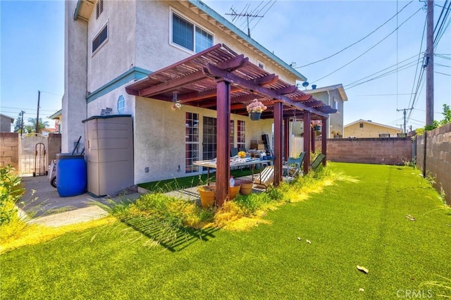 9419 Bartley Ave, Santa Fe Springs, CA 90670 - back of house with a pergola and stucco siding