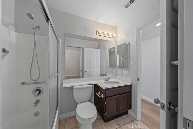 8840 Greenlawn St, Riverside, CA 92508 - bathroom with vanity, bathtub / shower combination, toilet, and tile patterned floors