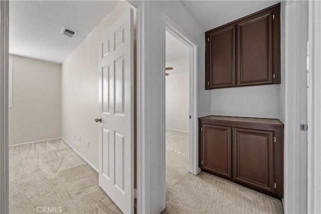 8840 Greenlawn St, Riverside, CA 92508 - hallway featuring light colored carpet and baseboards